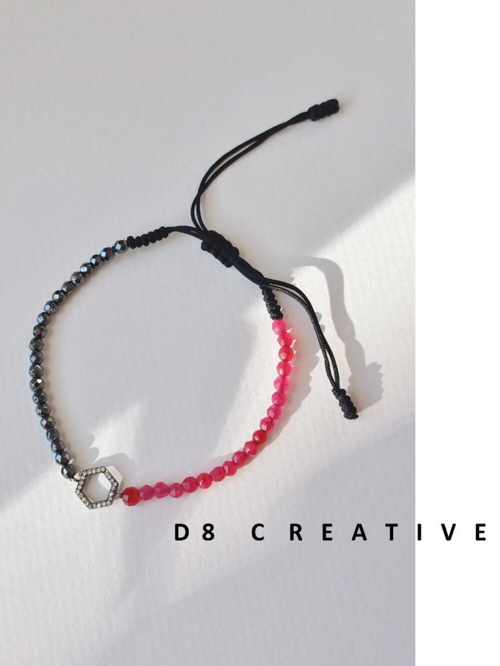 Hand woven pink agate with hematite and sterling silver pendant bracelet